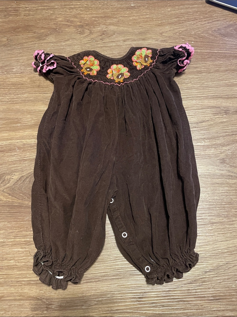 Brown smocked Thanksgiving Baby Romper with Pink Trim & turkey embroidery